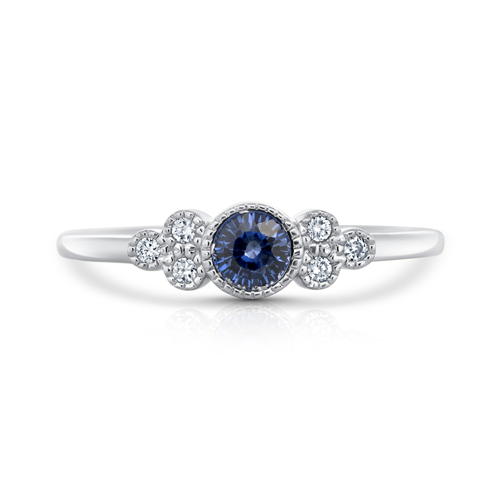View Sapphire And Diamond Bezel Set Ring